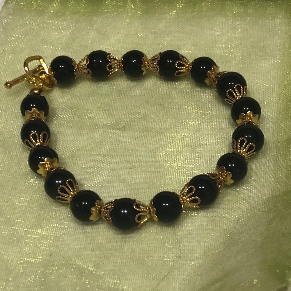 NWOT Black and gold bracelet